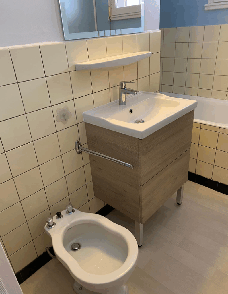 artisan-zepi - salle de bain avec bidet et meuble avec vasque